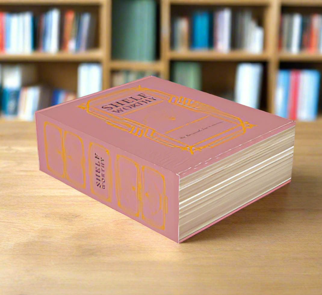 A product mockup of the shelf worthy mailer box that is designed to look like a vintage leatherbound book